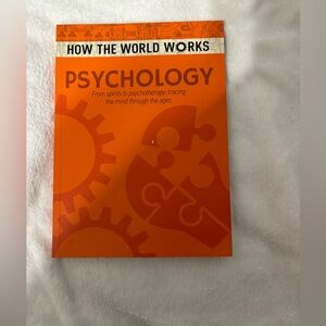 4/$20. Paperback Book. How the World Works: Psychology.